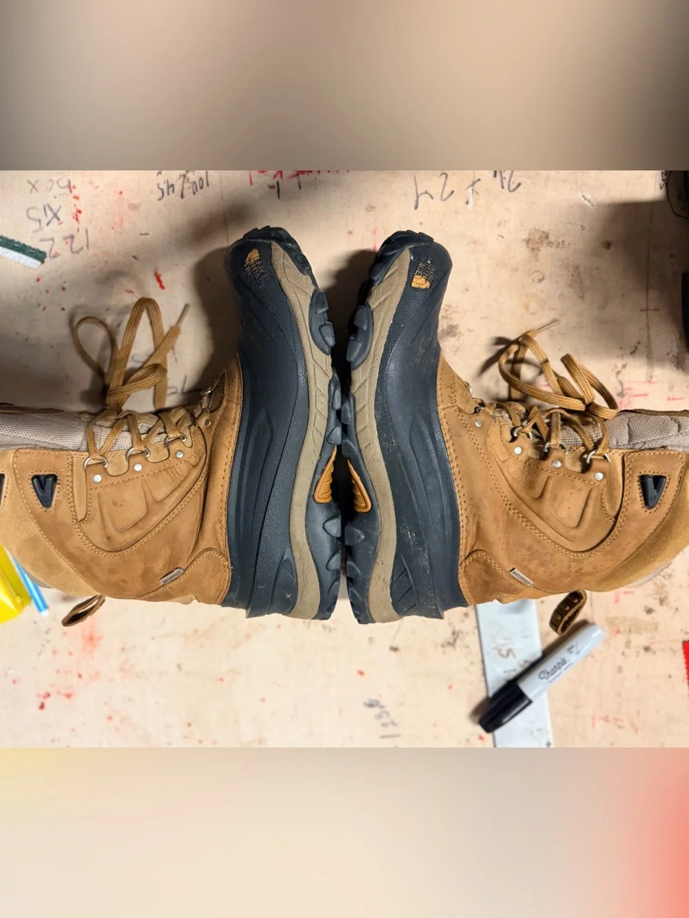The North Face Tan and Black hi king insulated boots